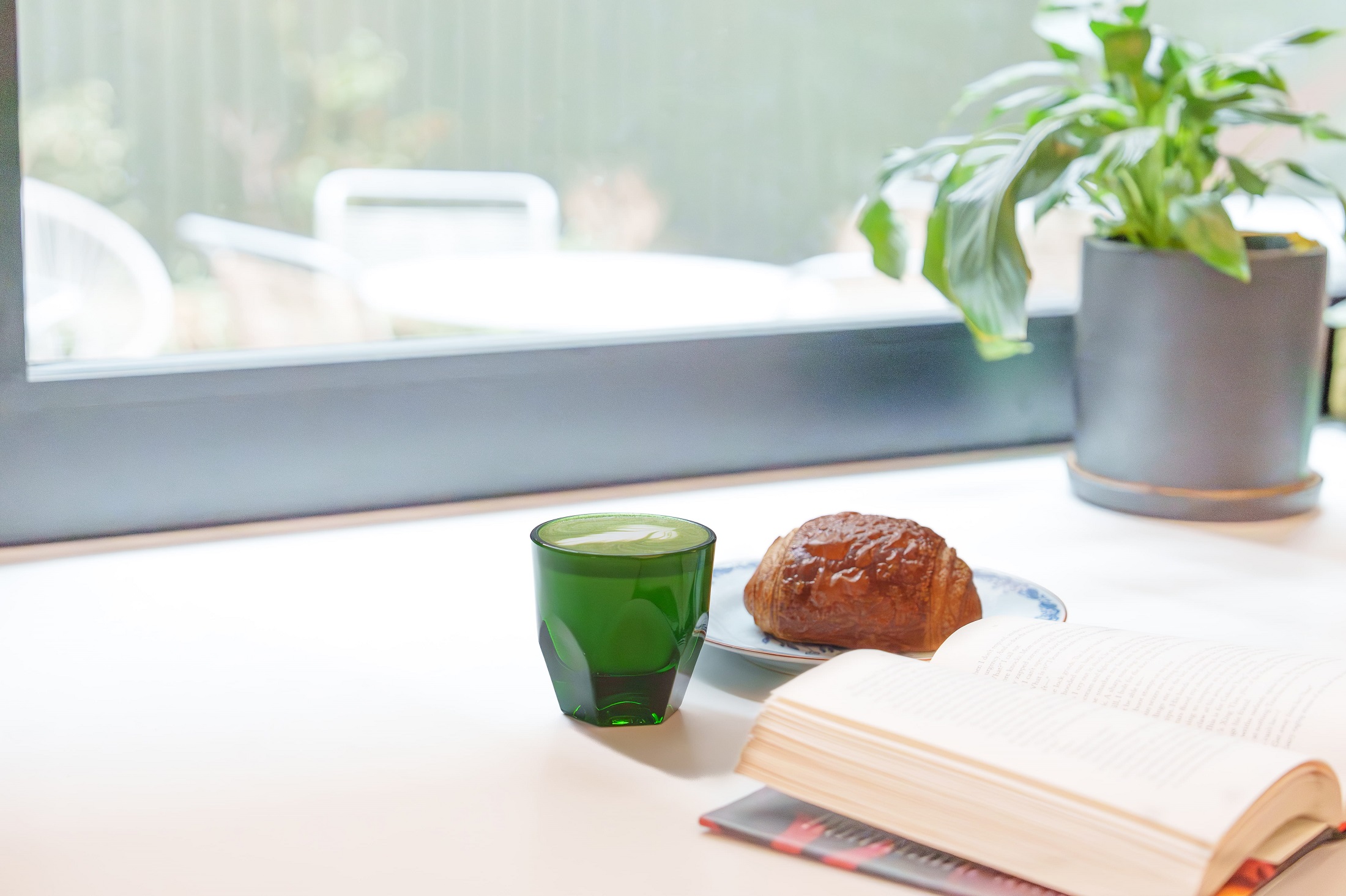 banner - a table with a book on it